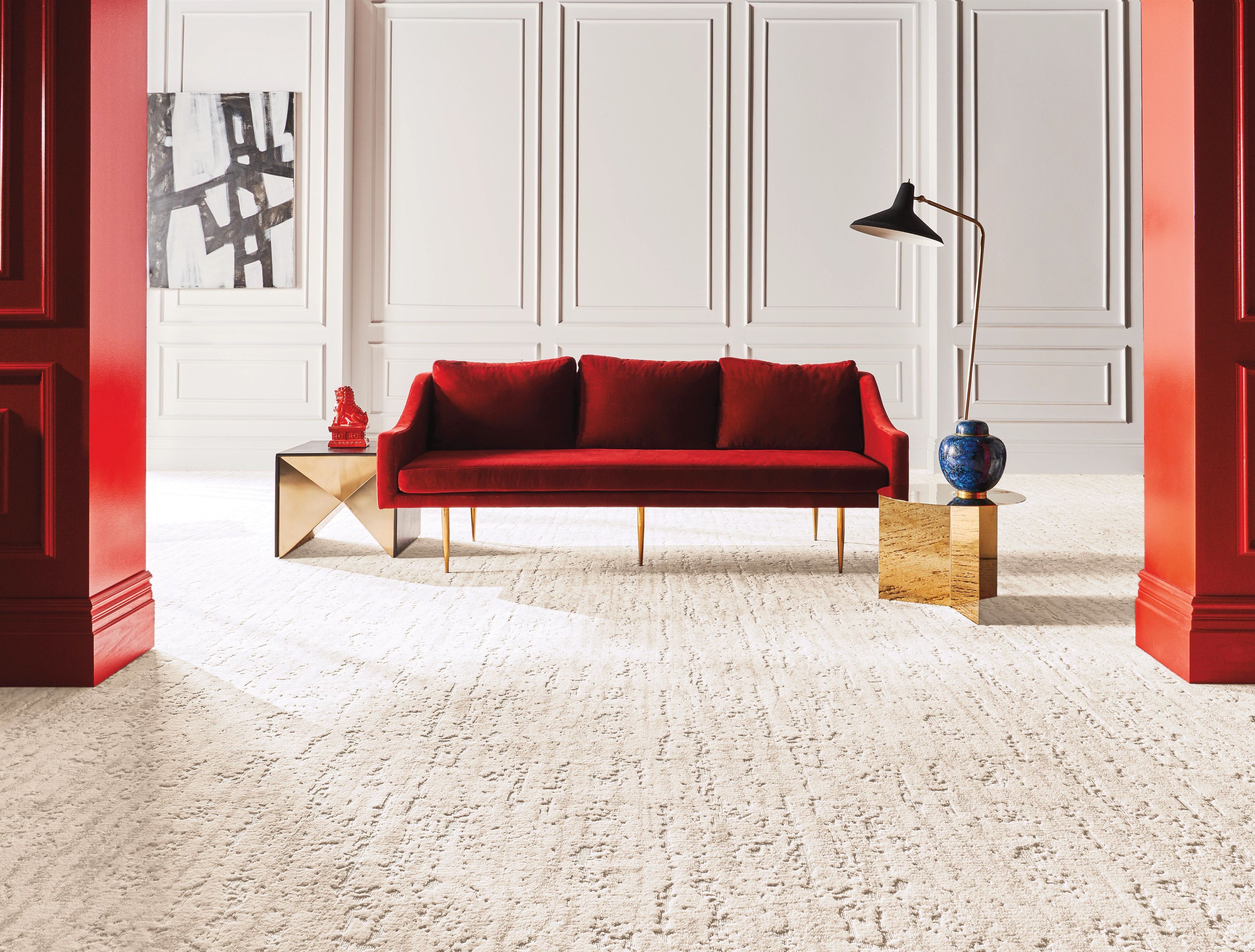 red sofa on carpet - bdflooringinc