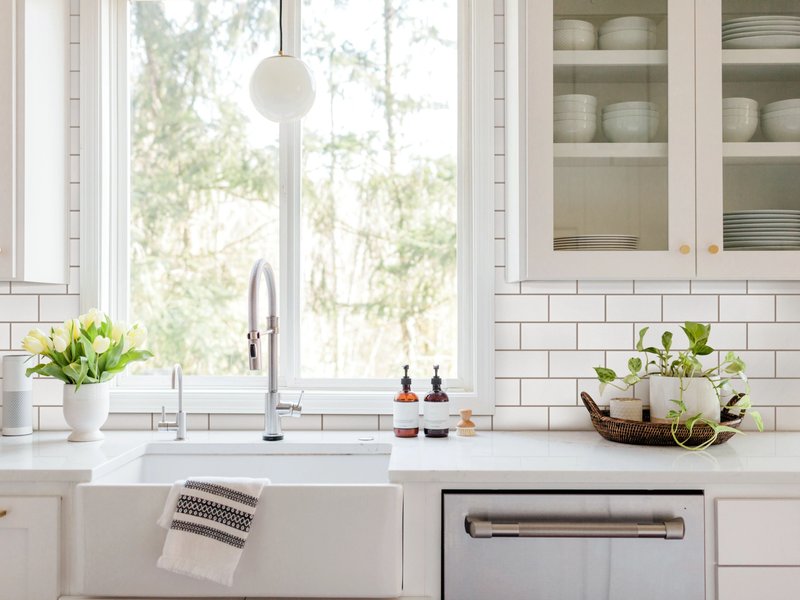 white kitchen with a sink and furniture - bdflooringinc